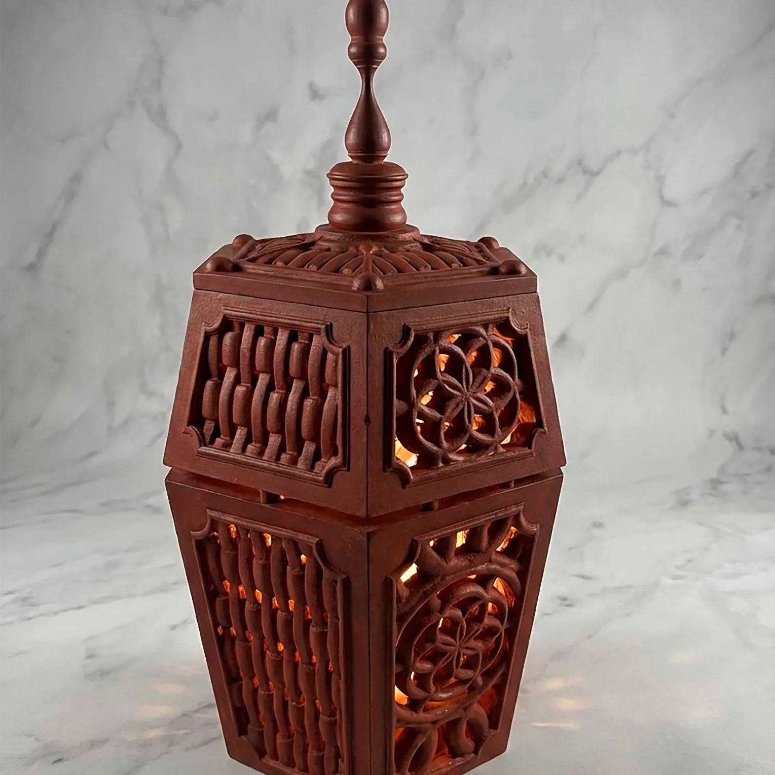 Tall carved wooden cabinet with concentric circular forms